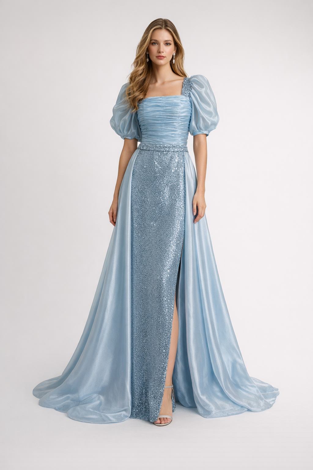 Lalah Woman wearing a light blue evening gown with puff sleeves on a white background ice-blue-crystal-luxury Evening dress