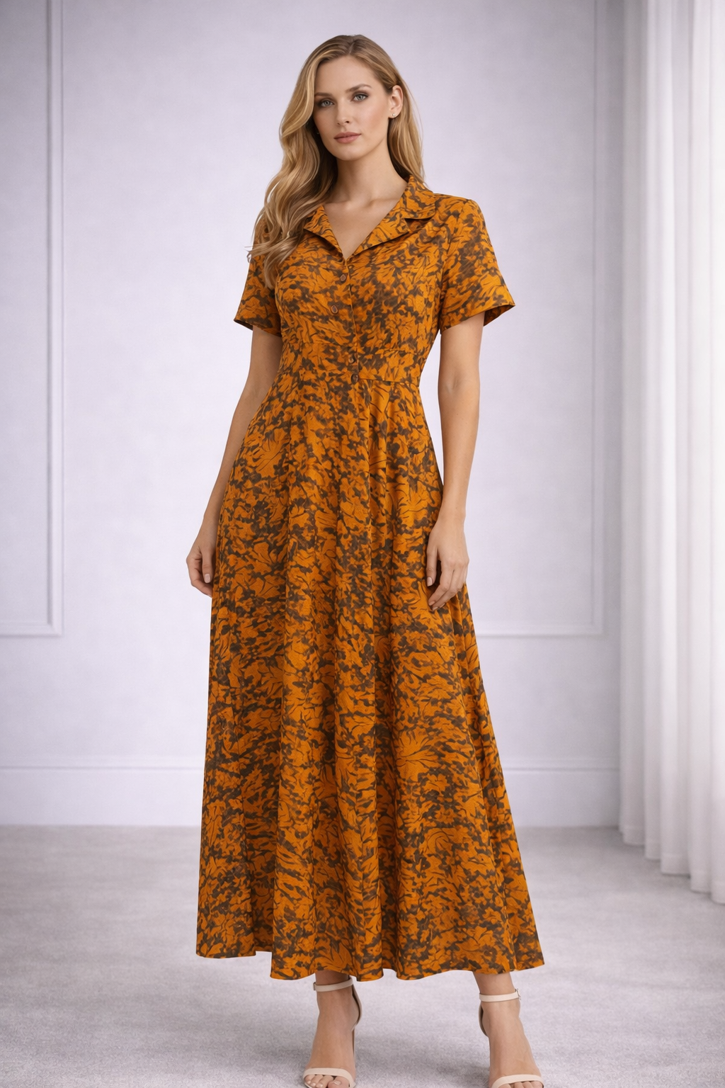 LALAH Woman wearing an orange floral dress against a white background