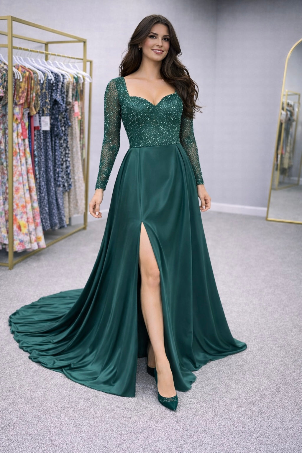 LALAH Woman wearing a green evening gown with a slit in a clothing store.